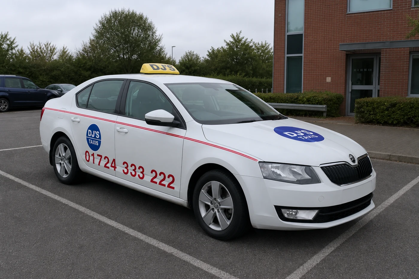 Silver Skoda Octavia four-seat DJ's Taxis saloon in DJ,S Scunthorpe livery